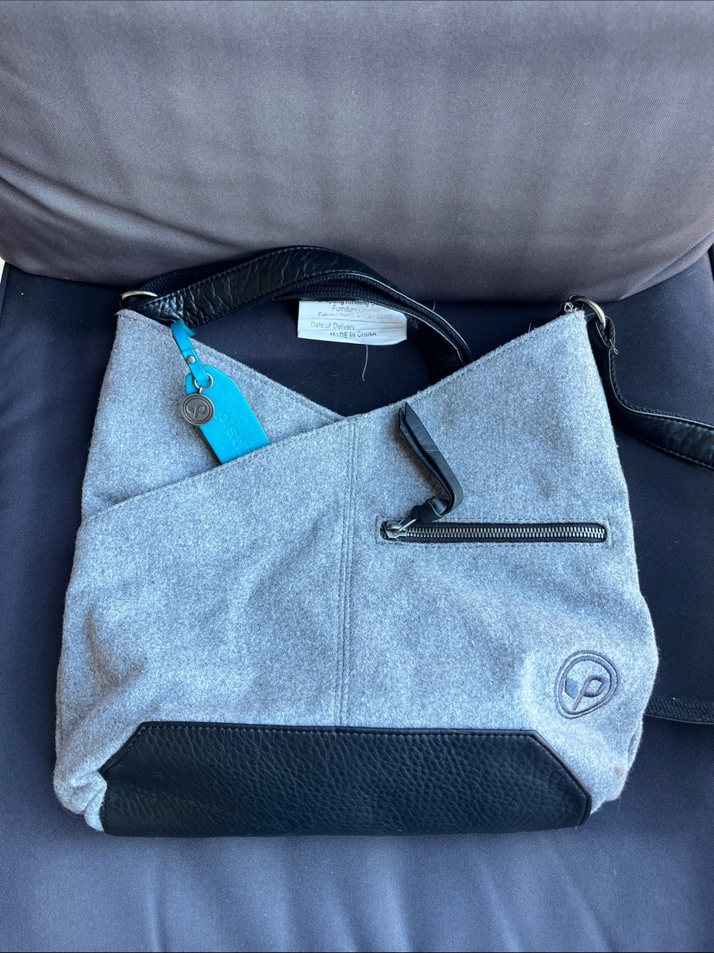 pistil Gray and Black Crossbody Bag with Teal Tag